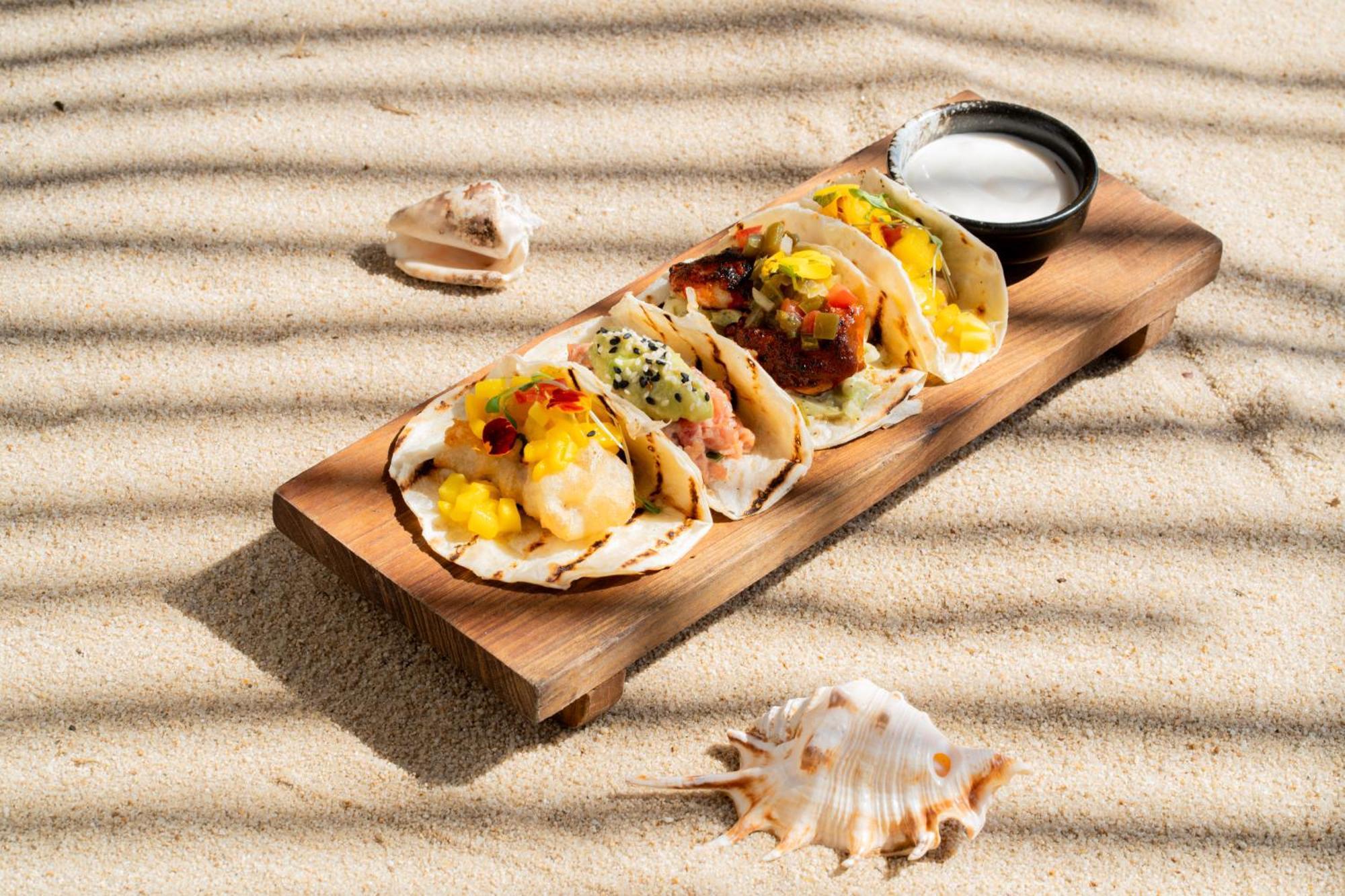 巴厘曼迪拉海滩Spa度假酒店 勒吉安 外观 照片 Tacos