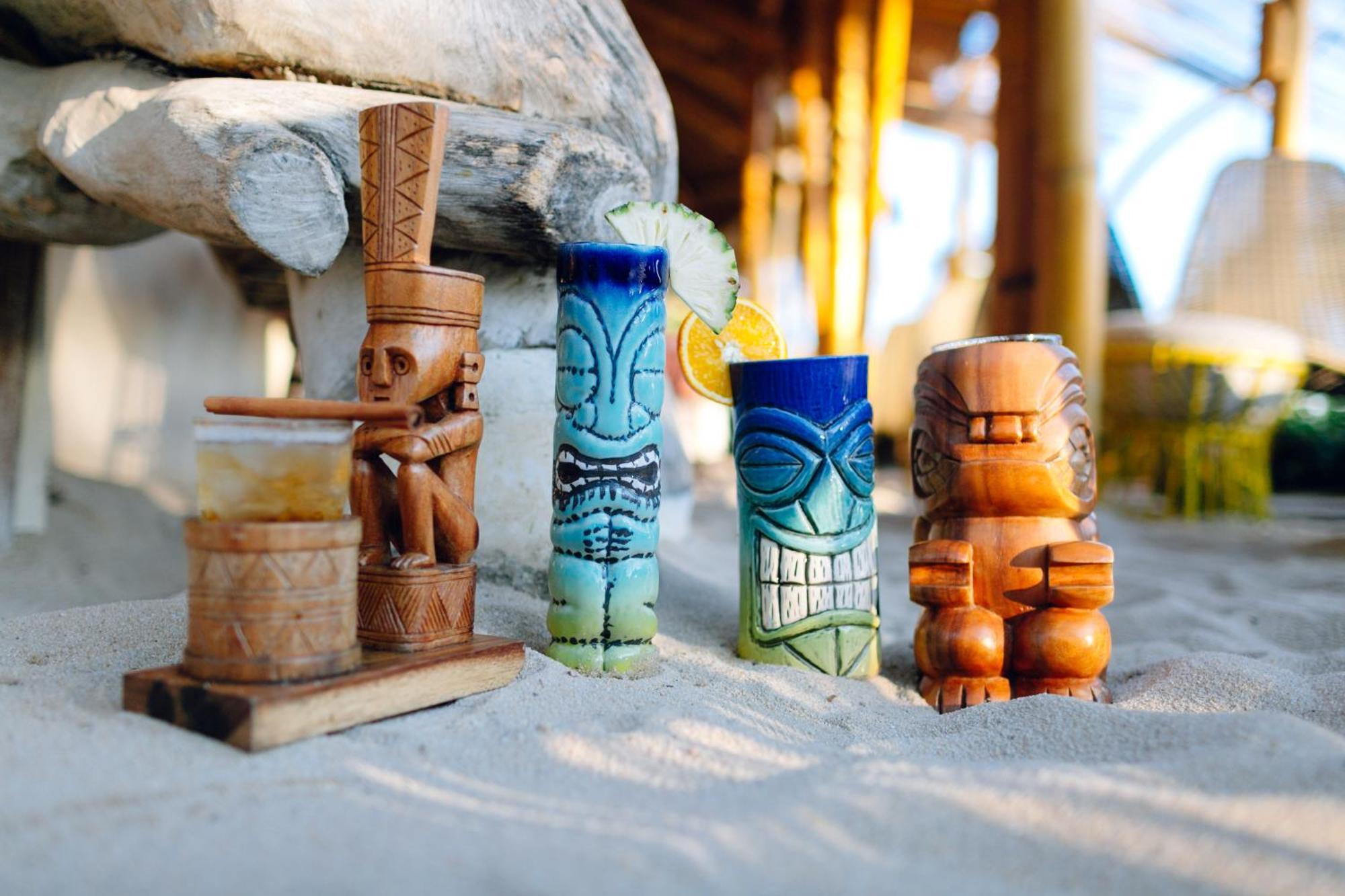 巴厘曼迪拉海滩Spa度假酒店 勒吉安 外观 照片 Tiki mugs