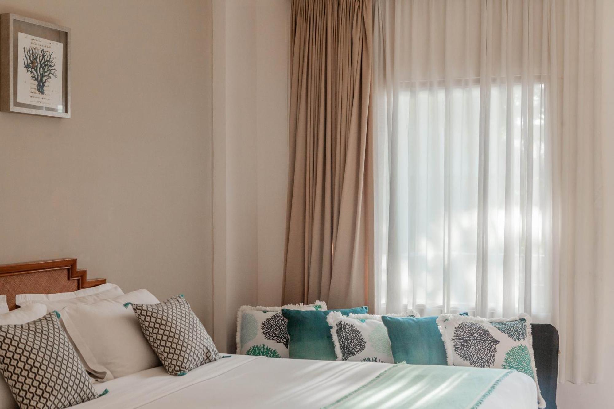 巴厘曼迪拉海滩Spa度假酒店 勒吉安 外观 照片 A bedroom at the hotel